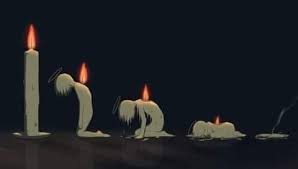 A single candle burning low in darkness, symbolizing fading love and the call to rekindle spiritual fire